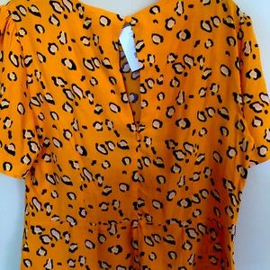 Orange print button blouse